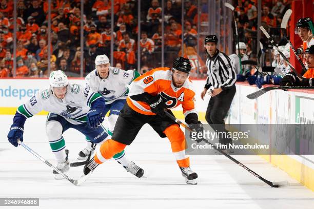 Ivan Provorov of the Philadelphia Flyers skates up the ice against the Vancouver Canucks at Wells Fargo Center on October 15, 2021 in Philadelphia,...