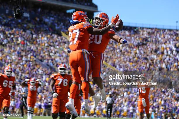 Dameon Pierce of the Florida Gators celebrates a touchdown during the second half against the LSU Tigers at Tiger Stadium on October 16, 2021 in...