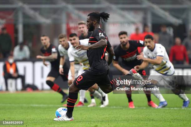Franck Kessie of AC Milan scores their team's second goal from the penalty spot during the Serie A match between AC Milan and Hellas Verona FC at...