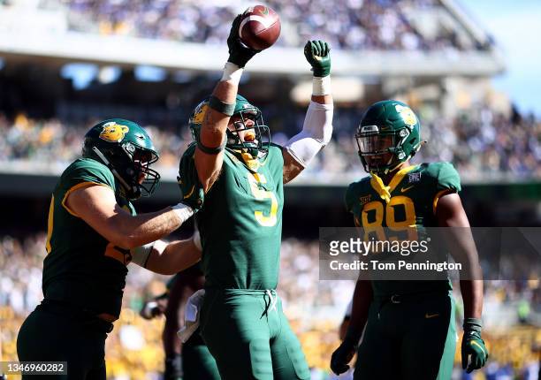 Linebacker Dillon Doyle of the Baylor Bears celebrates after scoring a touchdown against the Brigham Young Cougars in the first half at McLane...