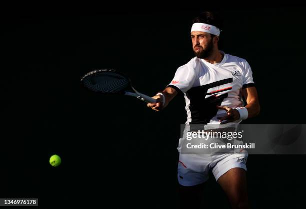 Nikoloz Basilashvili of Georgia plays a forehand against Taylor Fritz of the United States during their semifinal match on Day 13 of the BNP Paribas...