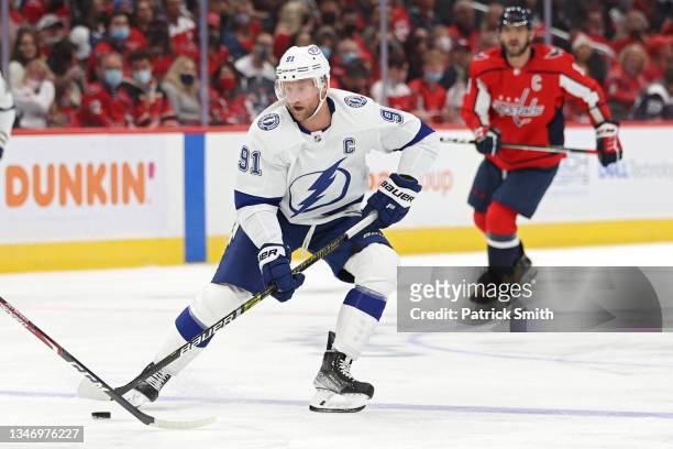 Steven Stamkos of the Tampa Bay Lightning skates past Alex Ovechkin of the Washington Capitals during the first period at Capital One Arena on...