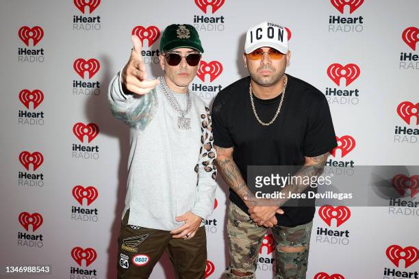 Yandel and Wisin of Wisin y Yandel attend the 2021 iHeartRadio Fiesta Latina at the Amway Center on October 16, 2021 in Orlando, Florida.