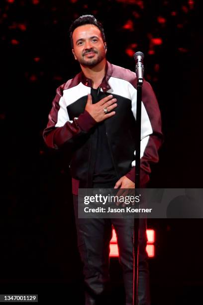 Luis Fonsi performs onstage during the 2021 iHeartRadio Fiesta Latina at the Amway Center on October 16, 2021 in Orlando, Florida.