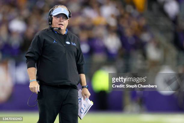 Head coach Chip Kelly of the UCLA Bruins looks on against the Washington Huskies during the second quarter at Husky Stadium on October 16, 2021 in...