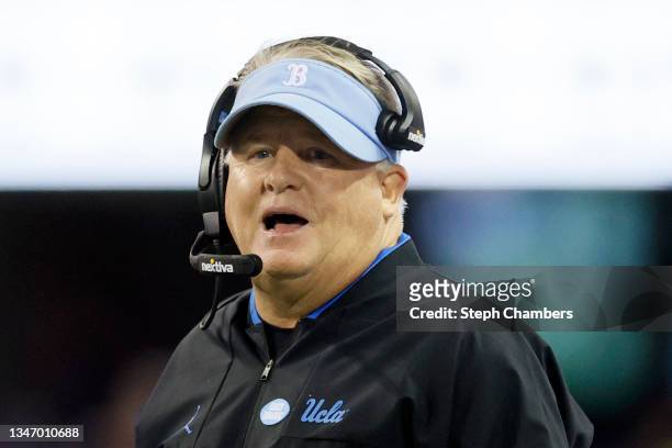 Head coach Chip Kelly of the UCLA Bruins looks on during the fourth quarter against the Washington Huskies at Husky Stadium on October 16, 2021 in...
