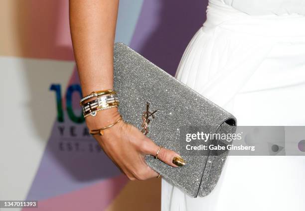 Amber Reyes, jewelry and purse details, attends the 25th annual Keep Memory Alive "Power of Love Gala" benefit for the Cleveland Clinic Lou Ruvo...