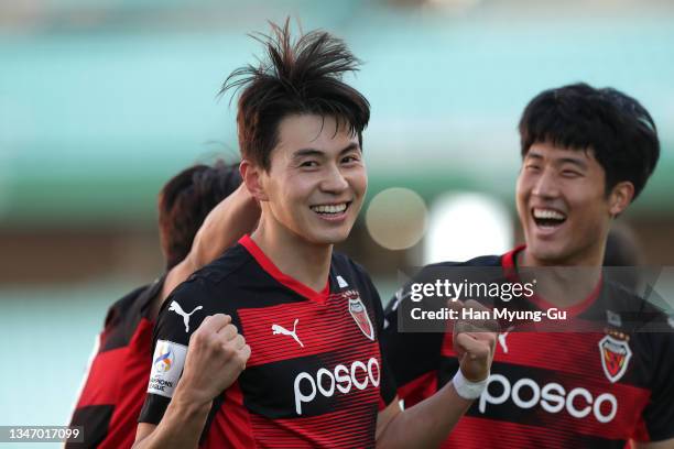 Lim Sang-Hyub of Pohang Steelers celebrates with his teammates after scoring their third goal during the AFC Champions League quarter final between...