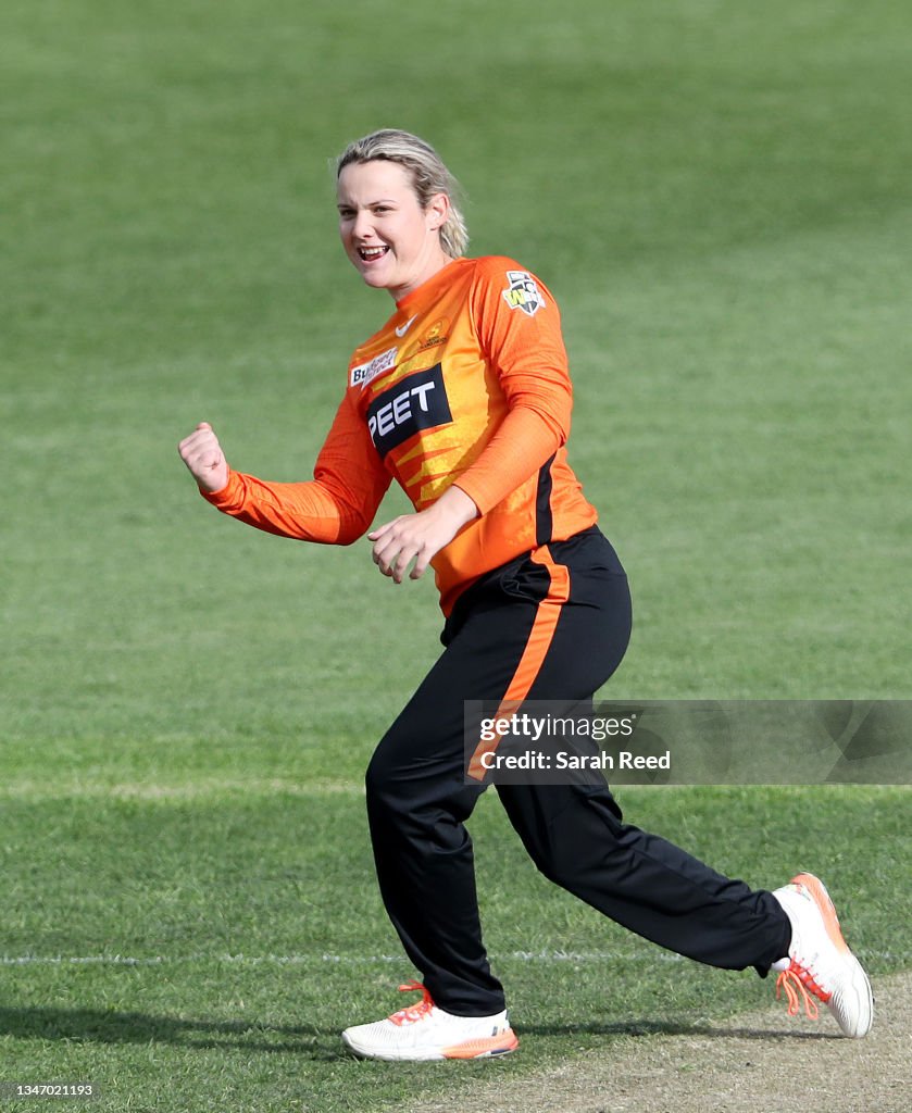 Lilly Rills Lilly Mills of the Perth Scorchers celebrates the wicket of Georgia ...