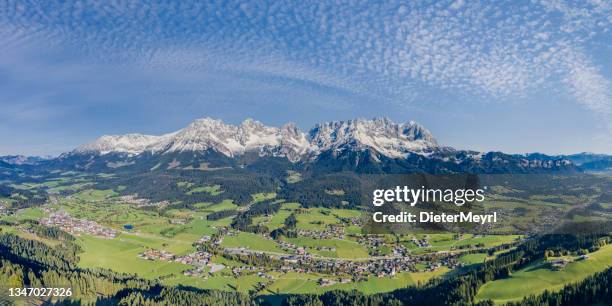 wild kaiser mountains in the alps - aerial photo - north tirol stock pictures, royalty-free photos & images