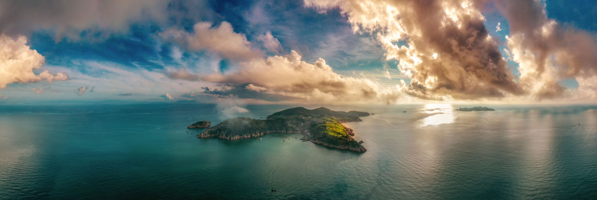 Aerial photography of sea; a small island in the sea Aerial photography of sea; a small island in the sea