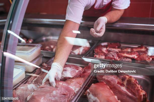 footgraphy of fresh meat - slager stockfoto's en -beelden