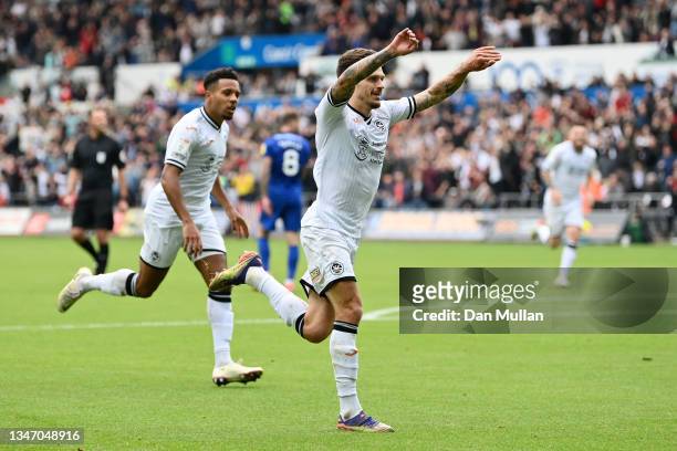 Jamie Paterson of Swansea City celebrates after scoring his sides first goal during the Sky Bet Championship match between Swansea City and Cardiff...