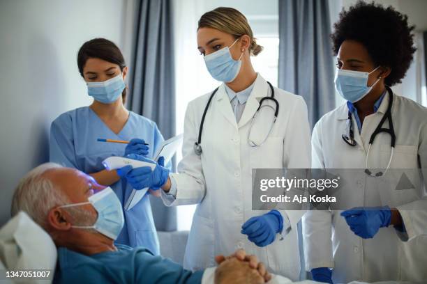 temperature measurement in the hospital. - infection control stock pictures, royalty-free photos & images