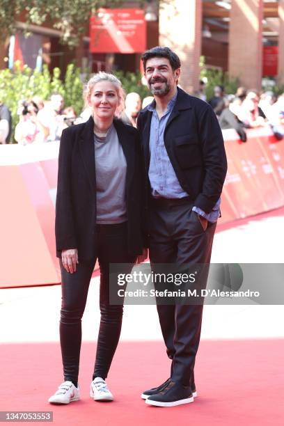 Amanda Sthers andPierfrancesco Favino attends the photocall of the movie "Promises" during the 16th Rome Film Fest 2021 on October 17, 2021 in Rome,...