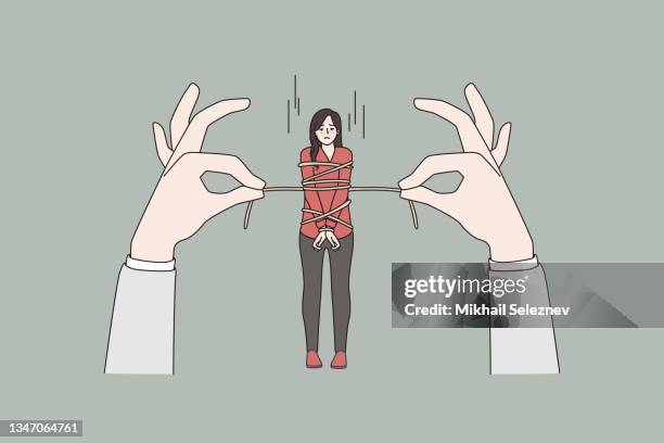 stressed woman tied with rope by huge hands - bullying at work stock illustrations