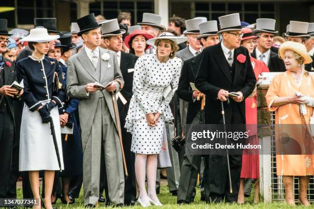 View of Diana, Princess of Wales , in a black and white, polka-dot dress and a matching, wide-brimmed hat, at the Epsom Derby, Epsom, England, June...