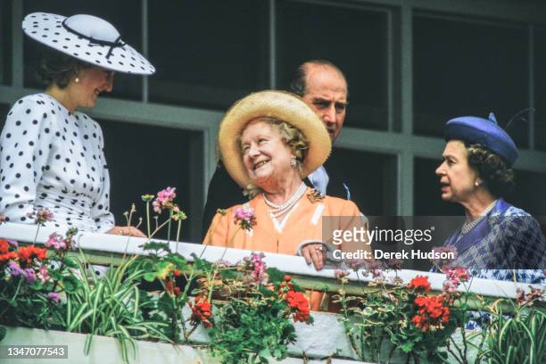View of, fore from left, Diana, Princess of Wales , in a black and white, polka-dot dress and a matching, wide-brimmed hat, Queen Elizabeth the Queen...