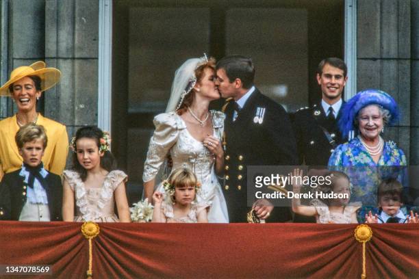 View of just-married couple Sarah, Duchess of York , and Prince Andrew, Duke of York , as they kiss on kiss the balcony of Buckingham Palace, London,...