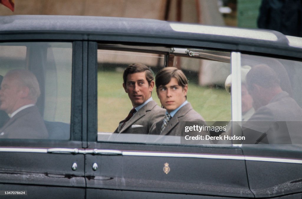 Princes Charles & Andrew Ride In A Rolls Royce