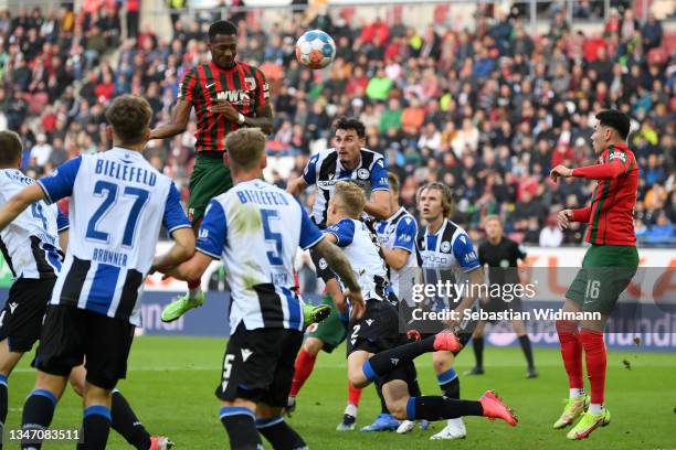 Reece Oxford of FC Augsburg scores their team's first goal during the Bundesliga match between FC Augsburg and DSC Arminia Bielefeld at WWK-Arena on...