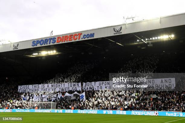General view inside the stadium as the fans of Newcastle United display a banner in support of the team prior to the Premier League match between...