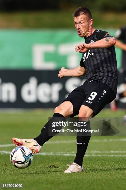 Marvin Pourie of Wuerzburg runs with the ball during the 3. Liga match between Viktoria Köln and Würzburger Kickers at Sportpark Hoehenberg on...