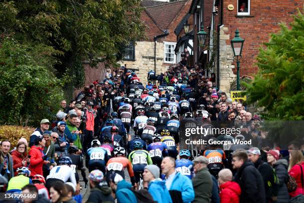 Spectators line the route as riders climb Michaelgate hill during the Men's HSBC UK National Road Championships on October 17, 2021 in Lincoln,...