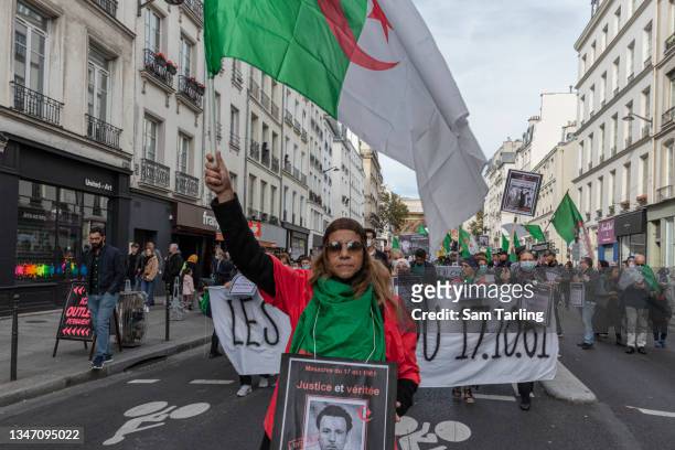 Members of France's Algerian community march through Paris to mark the 60th anniversary of the October 17, 1961 crackdown on Algerian protesters, on...