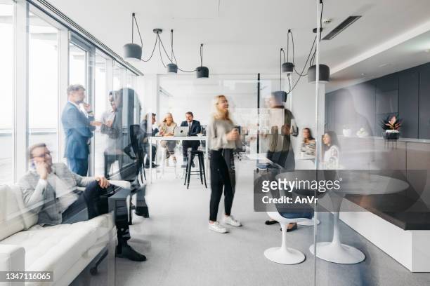 daily routine at the office - modern stock pictures, royalty-free photos & images