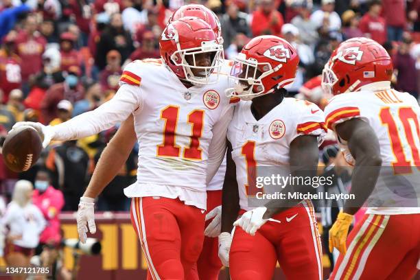 Demarcus Robinson of the Kansas City Chiefs celebrates his touchdown against the Washington Football Team during the fourth quarter at FedExField on...