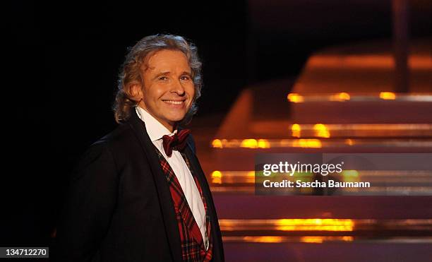 Thomas Gottschalk says good-bye to the audience during the 199th "Wetten dass...?" show at the Rothaus Hall on December 3, 2011 in Friedrichshafen,...