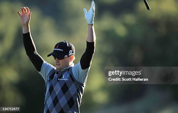 Zach Johnson reacts after holing out for eagle on the 18th hole during the third round of the Chevron World Challenge at Sherwood Country Club on...