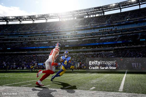 Kyle Rudolph of the New York Giants and Jordan Fuller of the Los Angeles Rams in action in the second half at MetLife Stadium on October 17, 2021 in...