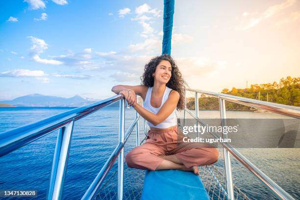 a girl standing at the bow yacht. - antalya province stock pictures, royalty-free photos & images