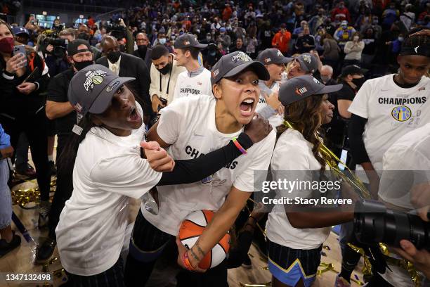Candace Parker and Kahleah Copper of the Chicago Sky celebrate after defeating the Phoenix Mercury in Game Four of the WNBA Finals to win the...