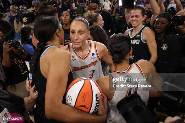 Candace Parker of the Chicago Sky hugs Diana Taurasi of the Phoenix Mercury after Game Four of the WNBA Finals at Wintrust Arena on October 17, 2021...