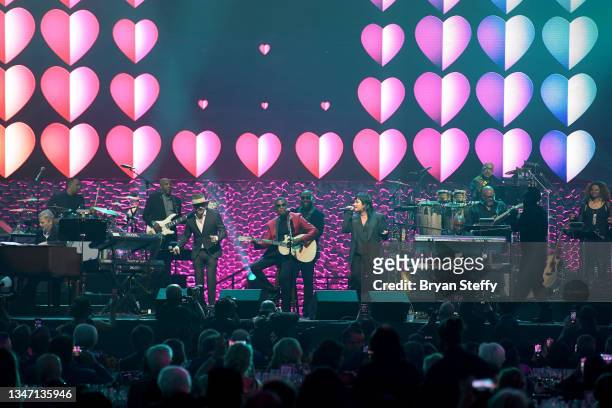 McLean, Kenny 'Babyface' Edmonds and Demi Lovato perform onstage during the 25th annual Keep Memory Alive 'Power of Love Gala' benefit for the...