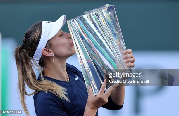 Paula Badosa of Spain kisses her winners trophy after her three set victory against Victoria Azarenka of Belarus during the womens final match on Day...