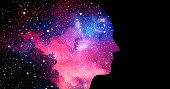 Vector illustration of human head on starry space background. Artificial intelligence or cosmic consciousness concept