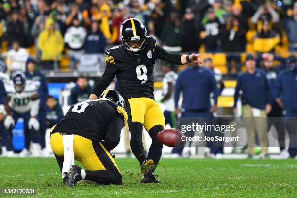 Chris Boswell of the Pittsburgh Steelers kicks a 37 yard field goal from placeholder Pressley Harvin III to win in overtime 23-20 over the Seattle...