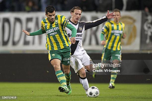 Aleksandar Radosavljevic of ADO Den Haag, Robbert Schilder of NAC Breda during the Dutch Eredivisie match between ADO Den Haag and NAC Breda at the...