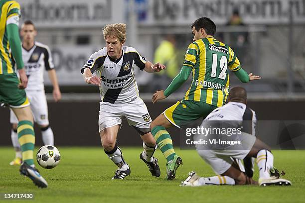 Tim Gilissen of NAC Breda, Aleksandar Radosavljevic of ADO Den Haag, Roly Bonevacia of NAC Breda during the Dutch Eredivisie match between ADO Den...