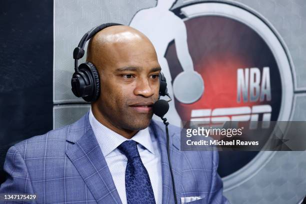 Commentator Vince Carter looks on prior to a preseason game between the Miami Heat and the Boston Celtics at FTX Arena on October 15, 2021 in Miami,...