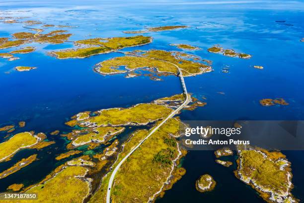 aerial view of beautiful road with bridge on the island smola, norway. - condado de more og romsdal fotografías e imágenes de stock