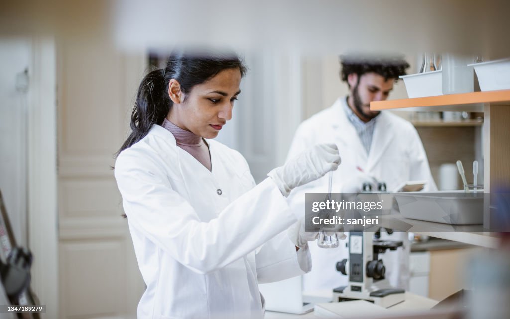 Working In Science Lab Scientist Working In The Laboratory High-Res Stock Photo - Getty Images