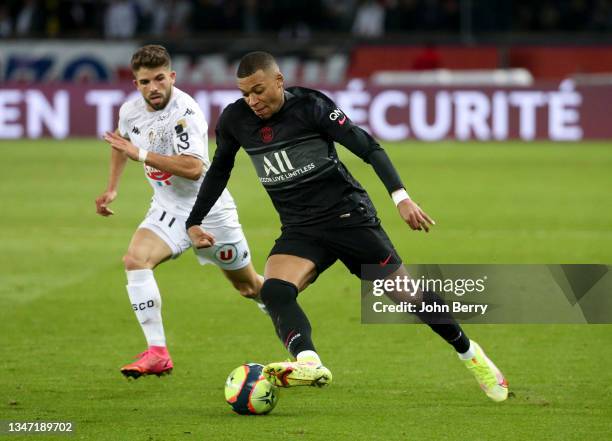Kylian Mbappe of PSG, Jimmy Cabot of Angers during the Ligue 1 Uber Eats match between Paris Saint-Germain and SCO Angers at Parc des Princes stadium...