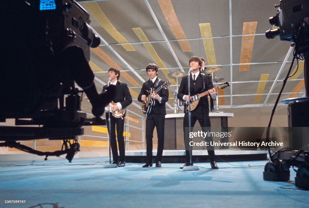 English Rock Band The Beatles, from left Paul McCartney, George Harrison, John Lennon, Ringo Starr performing on the Television Variety Series, "The Ed Sullivan Show", New York City, New York, USA, Bernard Gotfryd, February 1964