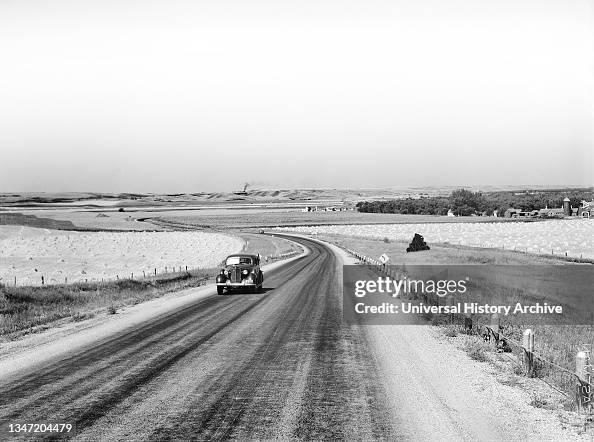 Minot Rural Highway and wheat fields near Minot, North Dakota, USA, Marion Post ...