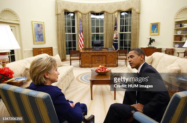 President Barack Obama meets with Secretary of State Hillary Clinton in the Oval Office shortly after she was confirmed and sworn in on Wednesday,...
